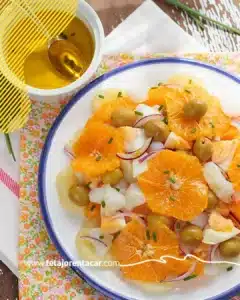 Summer car rental Málaga companion dish: ensalada malagueña with potato, orange, cod and green olives