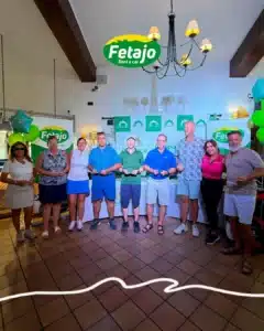 Winners of the Fetajo golf championship holding their trophies at El Chaparral Golf Club in Mijas