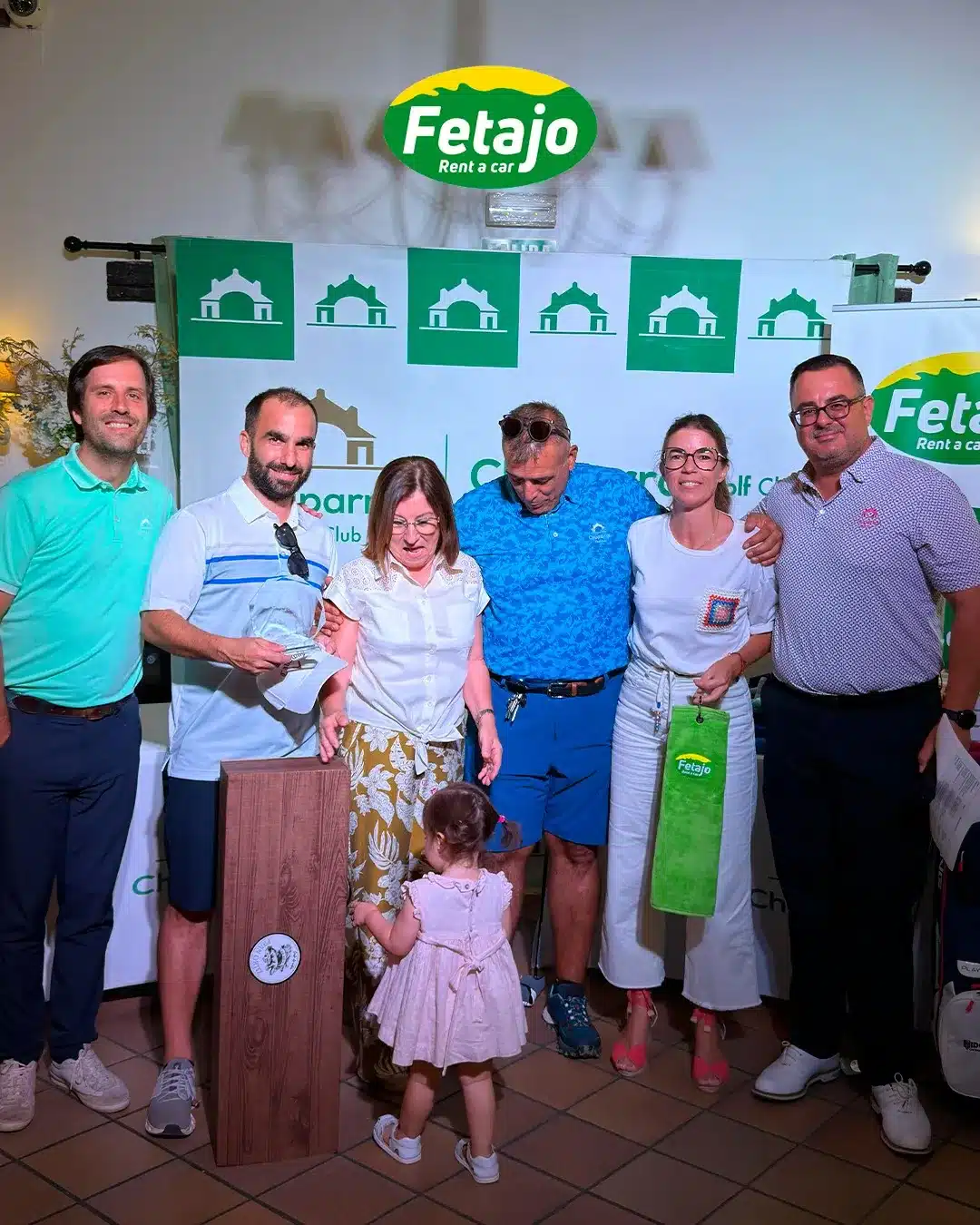 Category winner receiving his trophy at the Fetajo golf championship prize-giving