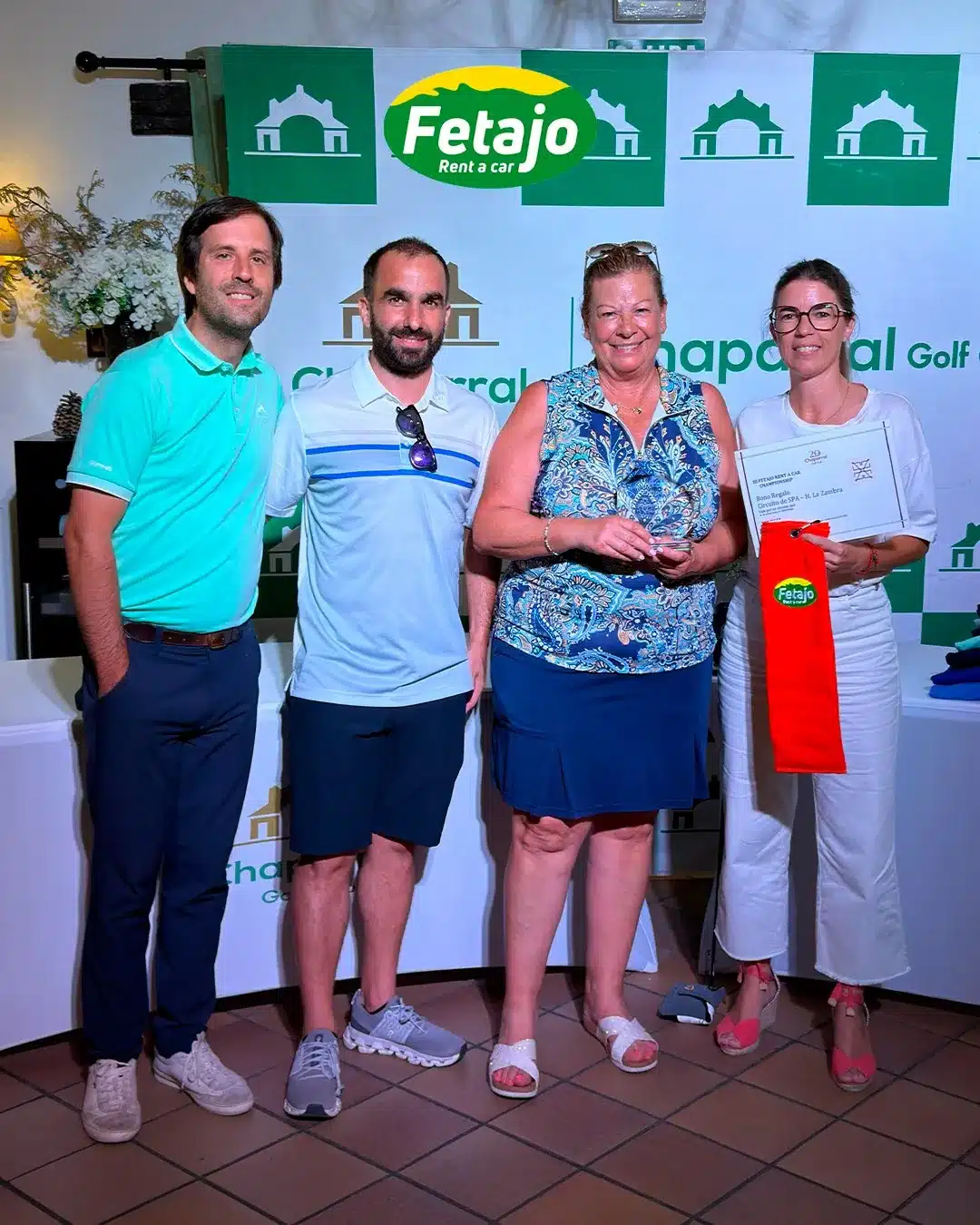 Ladies winner receiving a spa voucher at the Fetajo golf championship