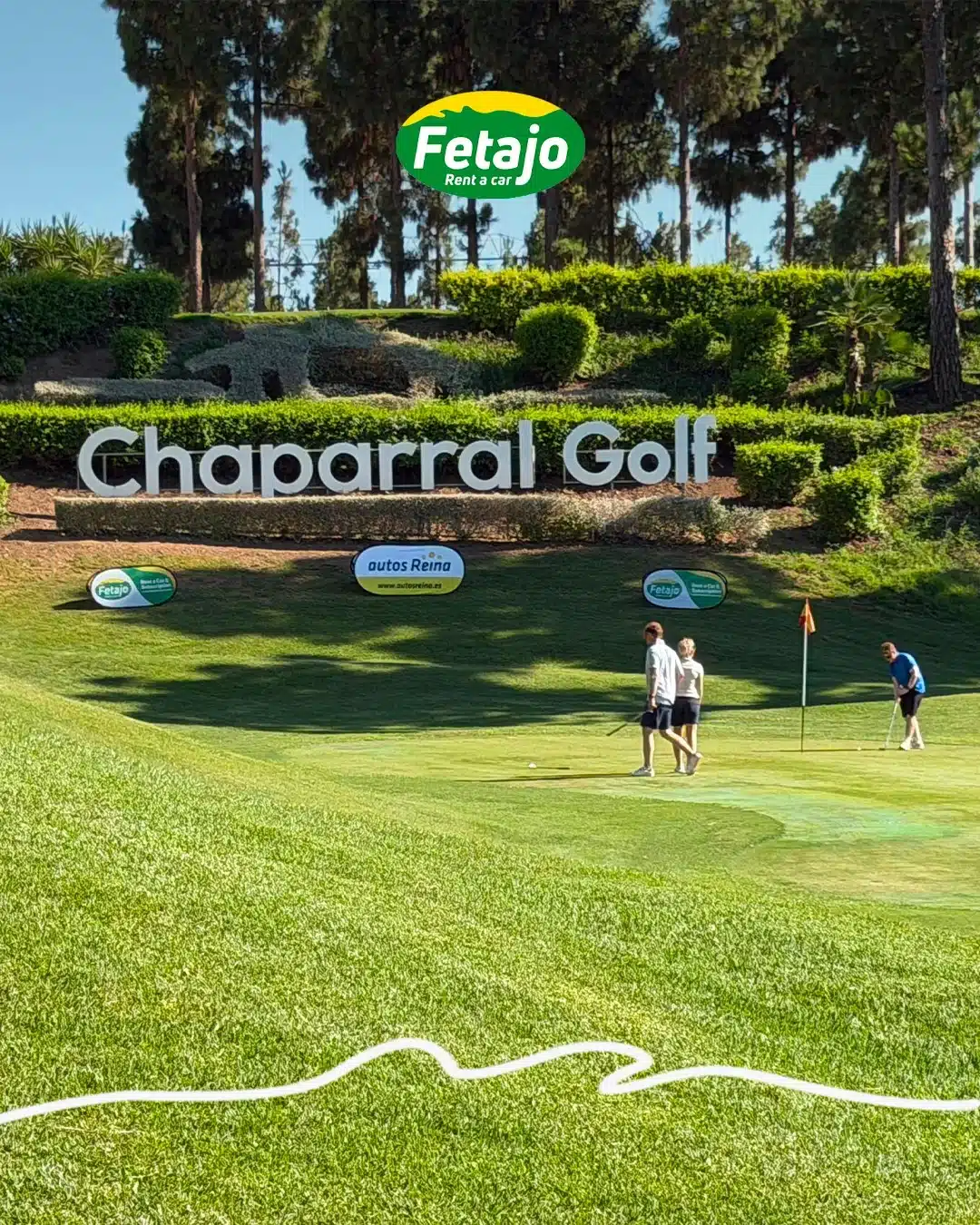 Golf in Mijas: the El Chaparral Golf Club sign and green sponsored by Fetajo Rent a Car